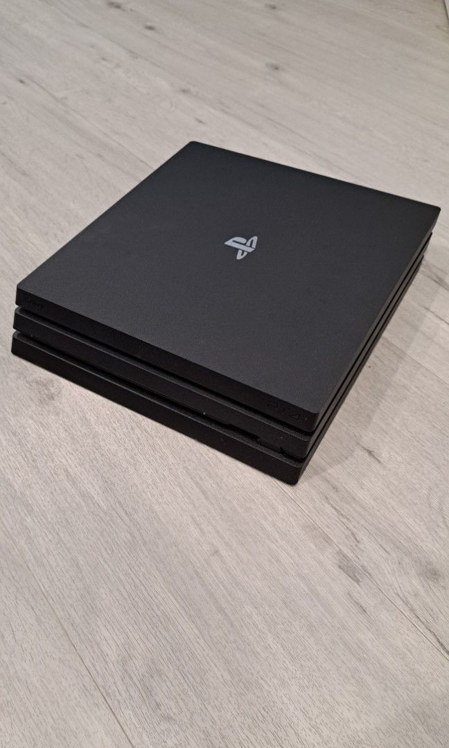 PS4 Pro (Category: PlayStation) located in Singapore. Submitted by dryxyz (Listing ID 1357675475, Image 3). Description: 1 TB PS4 pro with cooling fan attachment & lightly used controller.