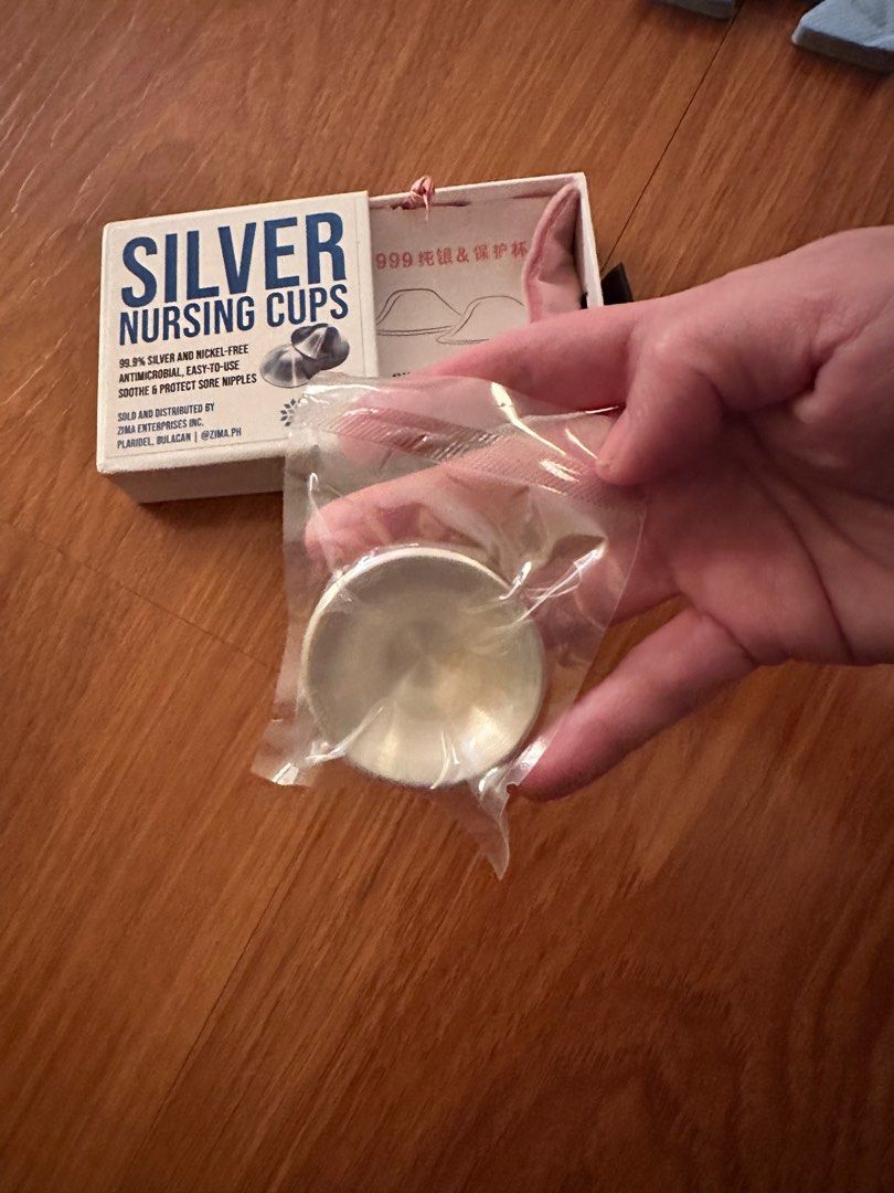 Silver Nursing Cups for breastfeeding mommies (Category: Breastfeeding & Bottle Feeding) located in Las Pinas. Submitted by t_bel (Listing ID 1357774611, Image 3). Description: Bought in La**** at php 1,687 Unused, sealed. Reason for selling- did not experience engorge breast or mastitis .