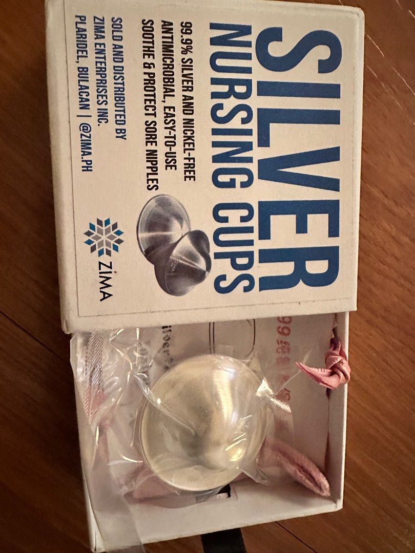 Silver Nursing Cups for breastfeeding mommies (Category: Breastfeeding & Bottle Feeding) located in Las Pinas. Submitted by t_bel (Listing ID 1357774611, Image 2). Description: Bought in La**** at php 1,687 Unused, sealed. Reason for selling- did not experience engorge breast or mastitis .