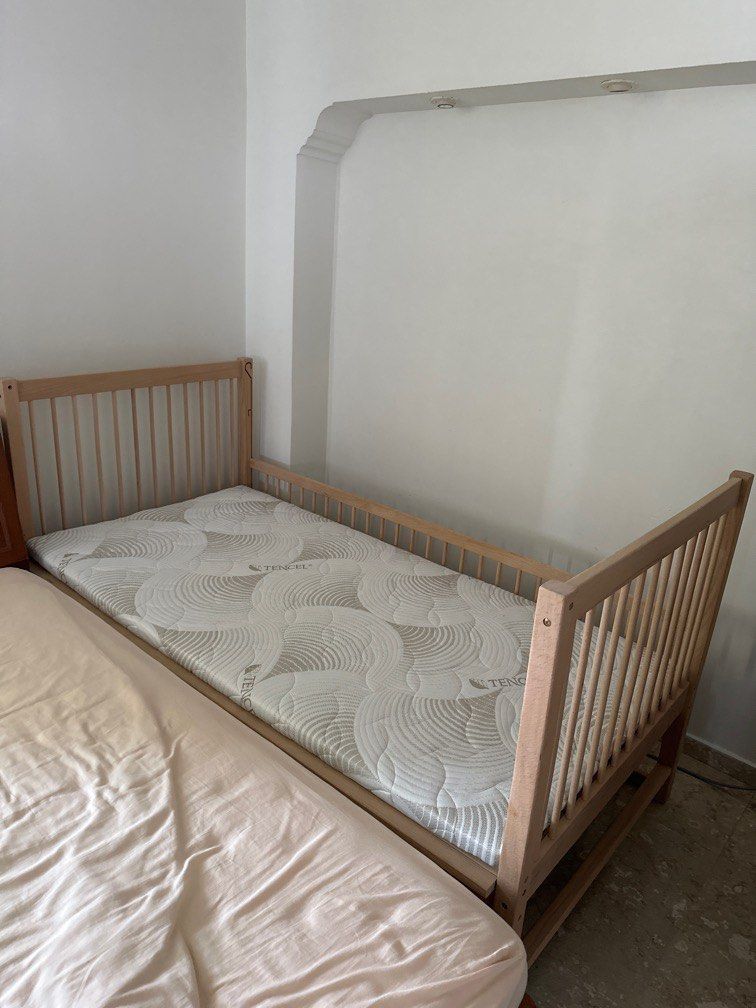 Solid Preloved bed frame (Category: Bed Frames & Mattresses) located in Singapore. Submitted by junnyea (Listing ID 1357642777, Image 1). Description: Move out this week so all let go at scrap price Contact 9723230.