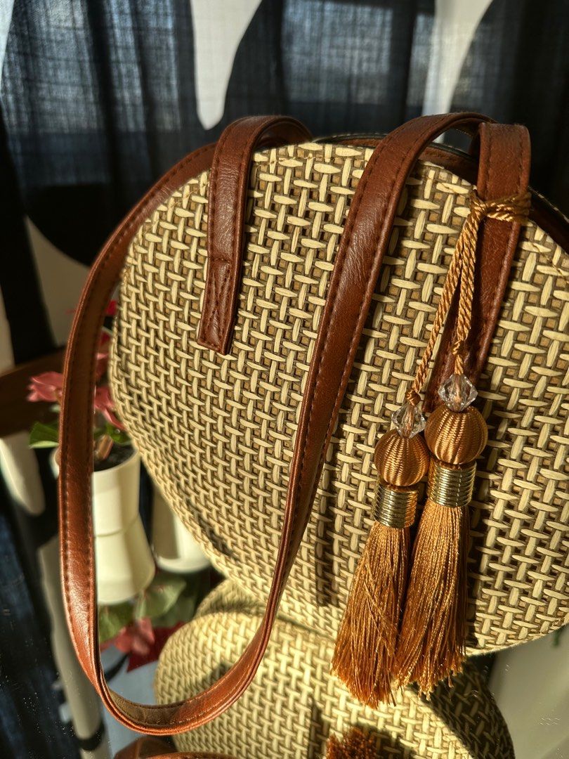Straw Woven Round Bag with Tassel (Category: Shoulder Bags) located in Bayan Lepas. Submitted by httpdons (Listing ID 1357592368, Image 2). Description: ✅ Condition 9/10 ✅ Zip still functional ✅ All straws still intact ✅ Comes with dust bag .