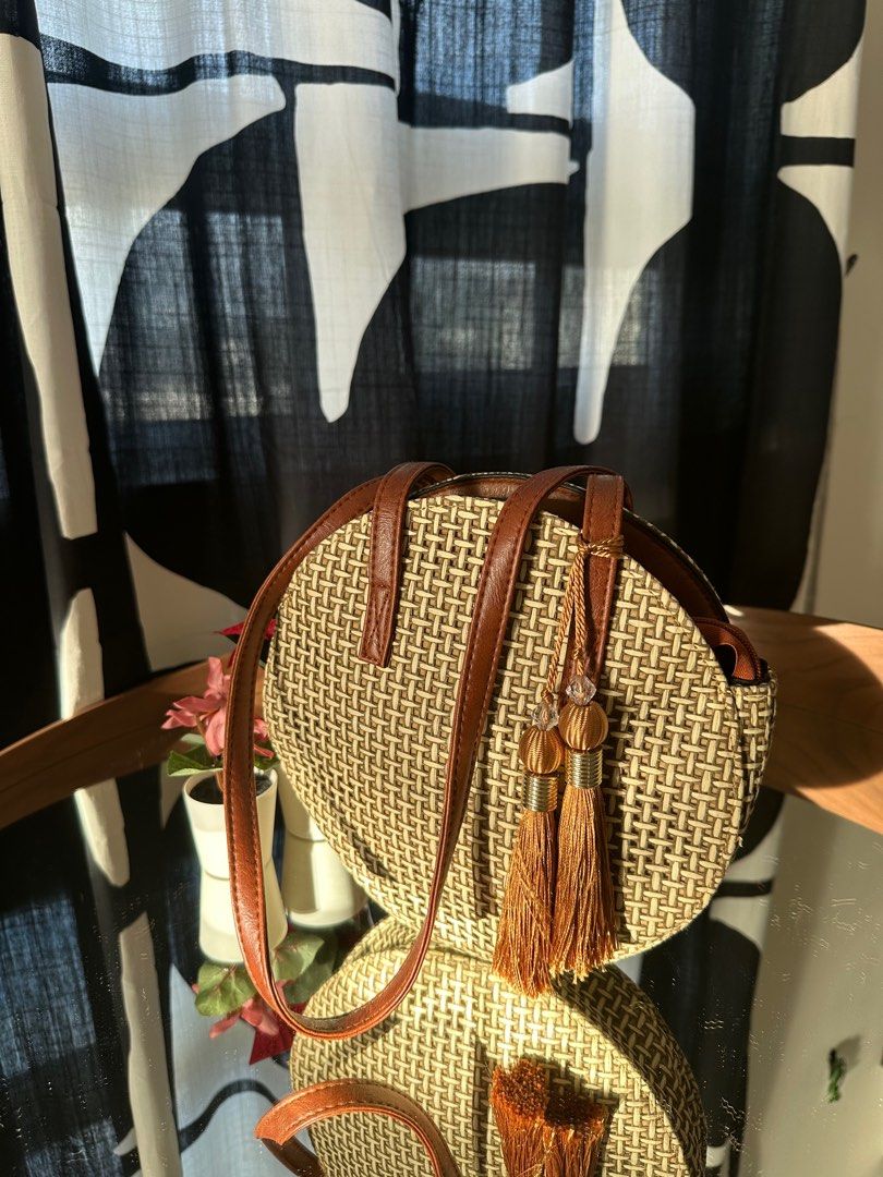 Straw Woven Round Bag with Tassel (Category: Shoulder Bags) located in Bayan Lepas. Submitted by httpdons (Listing ID 1357592368, Image 1). Description: ✅ Condition 9/10 ✅ Zip still functional ✅ All straws still intact ✅ Comes with dust bag .
