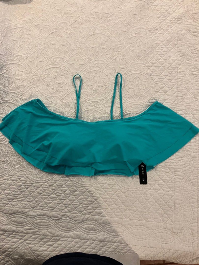 Turquoise bikini top 2XL-3XL (Category: Bikinis & Swimsuits) located in Makati City. Submitted by pleasesleep (Listing ID 1357596835, Image 1). Description: Tempt Me XXL Bikini top. BNWT. Bought on carousell but too big for me. Please see photos for tape measurements..