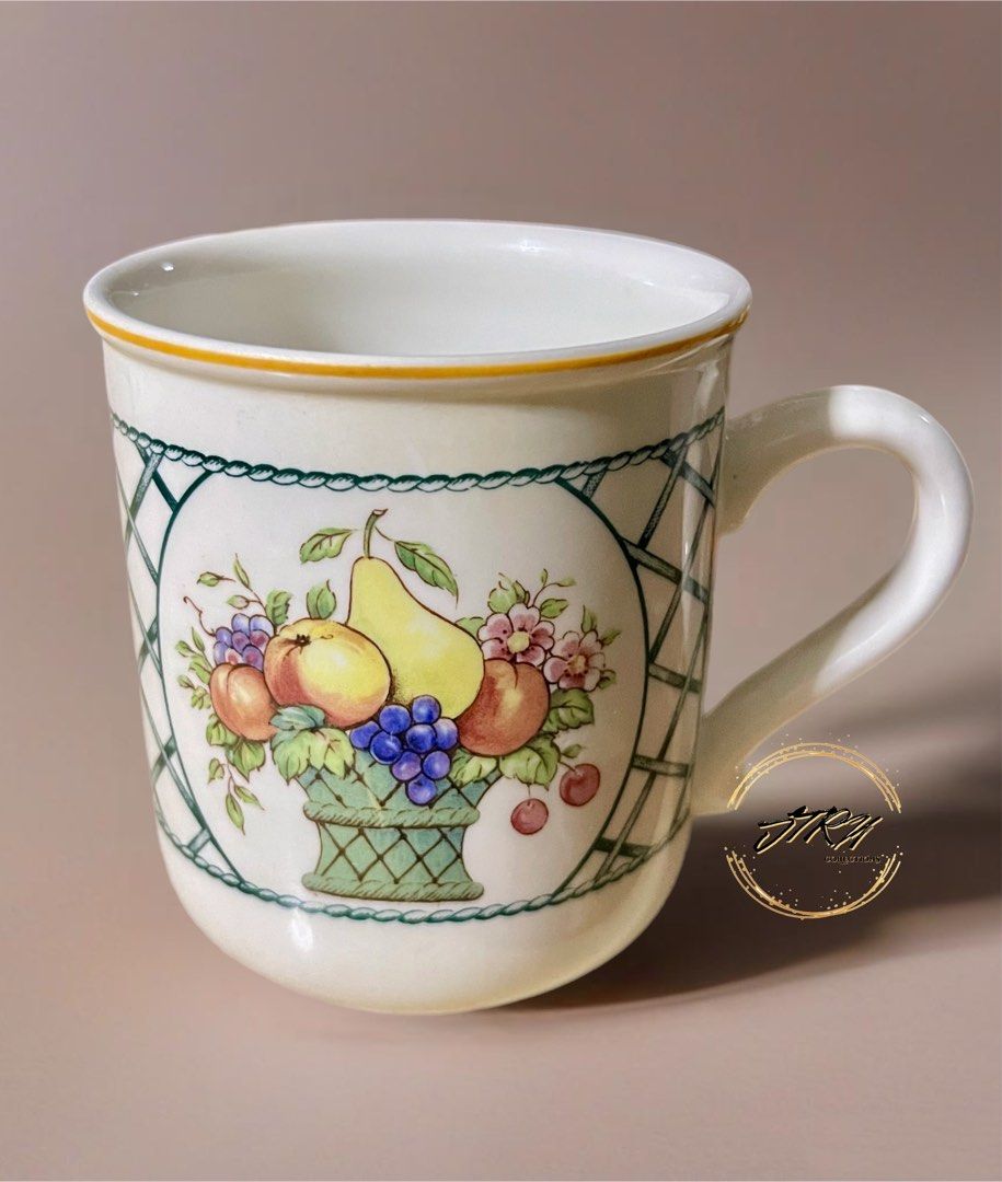 Villeroy & Boch “Basket Pattern” Mug (Category: Coffee & Tea Tableware) located in Marikina City. Submitted by jtrncollections (Listing ID 1357662866, Image 1). Description: Villeroy & Boch “Basket” Mug Produced from 1983 to 2007. Pattern: Basket by Villeroy & Boch Status: Discontinued. Actual: 1983 - 2007 Basket by Villeroy & Boch is a striking dinnerware pattern featuring a charming fruit basket design accented by a graceful green and white lat