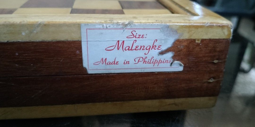Chess board (Category: Other Sports Equipment and Supplies) located in Del Monte. Submitted by allangonza03221 (Listing ID 1357957546, Image 1). Description: chess board good for travel good for your kids hindi ko alam kung narra or kamagong basta solid woods at mabigat...