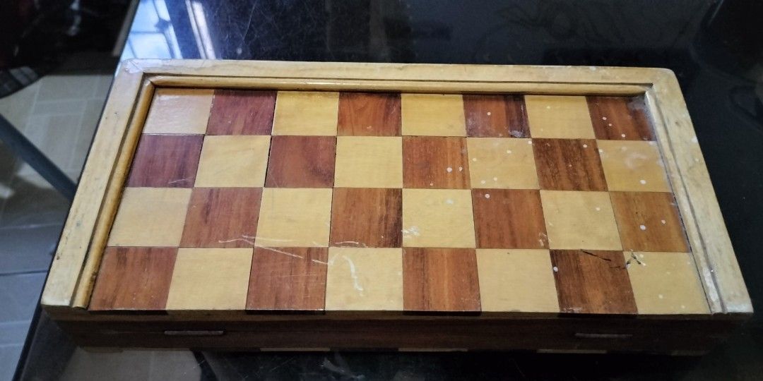 Chess board (Category: Other Sports Equipment and Supplies) located in Del Monte. Submitted by allangonza03221 (Listing ID 1357957546, Image 2). Description: chess board good for travel good for your kids hindi ko alam kung narra or kamagong basta solid woods at mabigat...