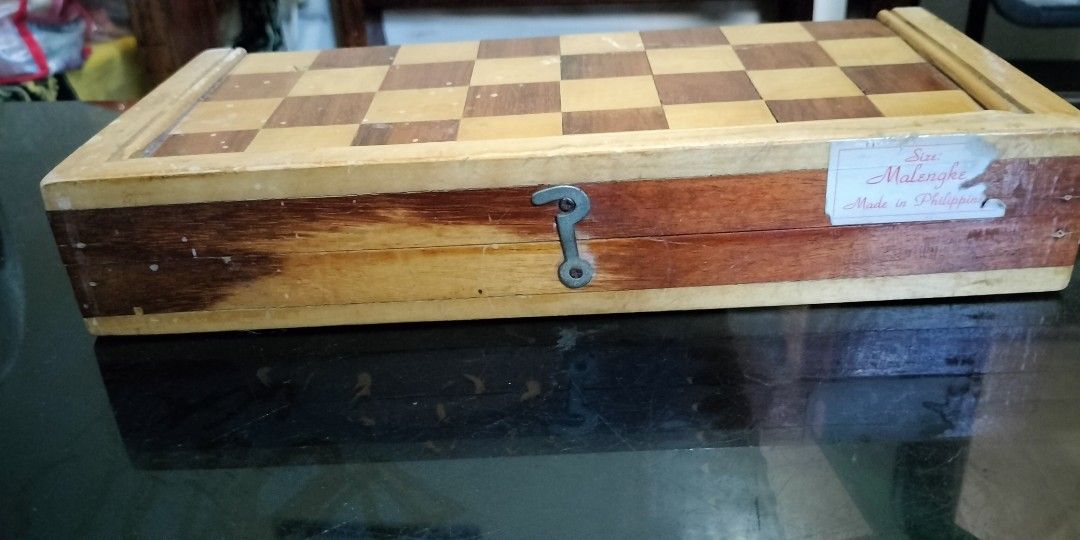 Chess board (Category: Other Sports Equipment and Supplies) located in Del Monte. Submitted by allangonza03221 (Listing ID 1357957546, Image 3). Description: chess board good for travel good for your kids hindi ko alam kung narra or kamagong basta solid woods at mabigat...