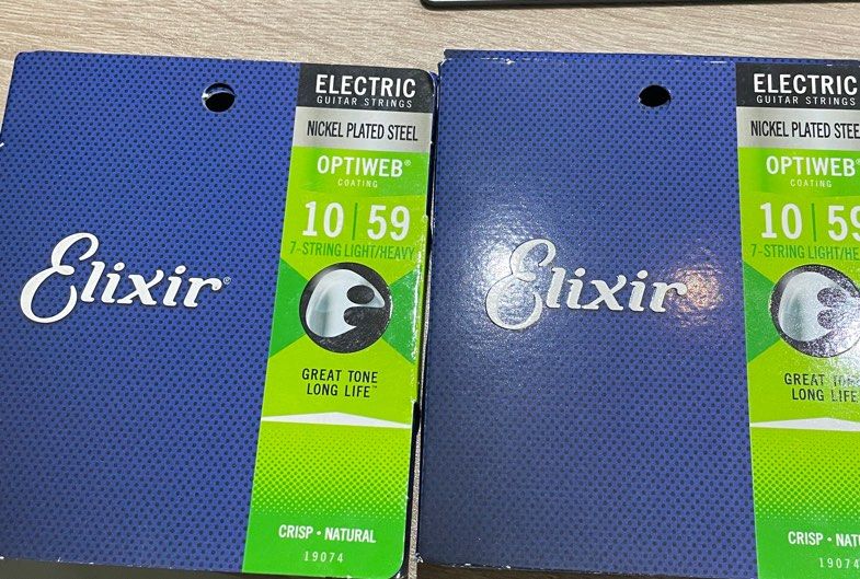 Elixir Strings Optiweb (Category: Music Accessories) located in Singapore. Submitted by adagiomalique (Listing ID 1357969352, Image 1). Description: Elixir Optiweb 10-59 for $15 each Elixir Optiweb 10-46 3 sets dor $38…each $14.