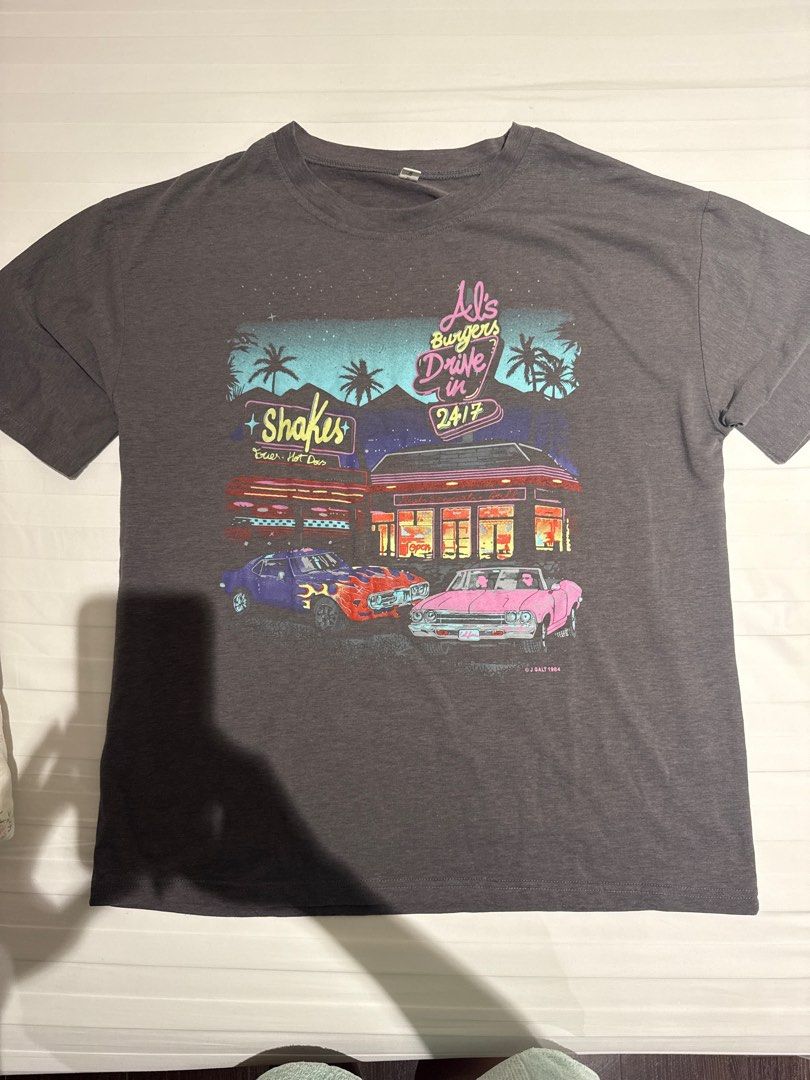 Vintage night diner oversized tee 🌙 (Category: Shirts) located in Mandaluyong City. Submitted by outofstoragewtf (Listing ID 1357943558, Image 2). Description: - RFS: too many shirts - WW is actual photo - length: 25" - oversized, size M on tag - no flaws - no additional photos.