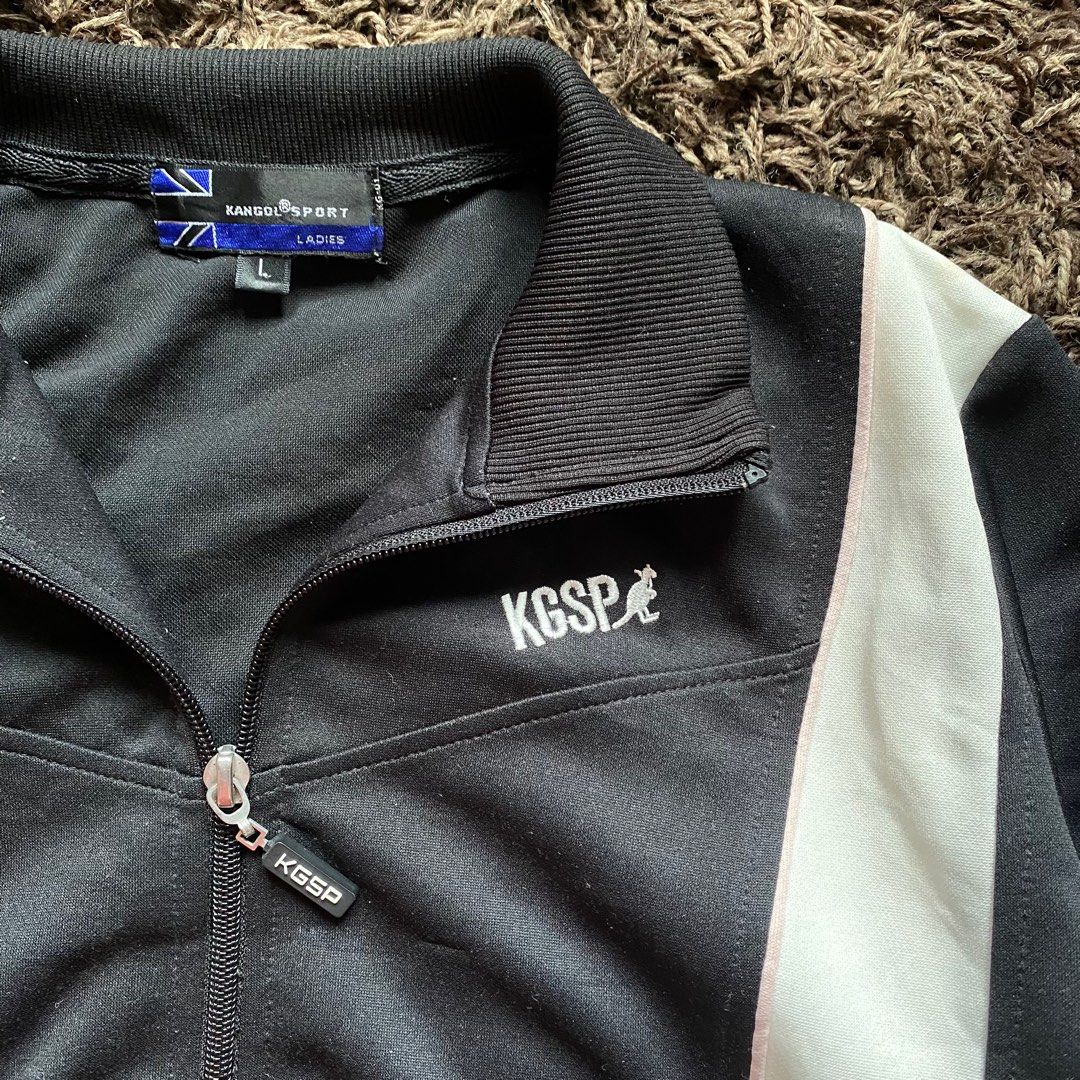 Kangol Sport - Ladies Track Jacket (Category: Coats, Jackets and Outerwear) located in Cavite. Submitted by lloydcabrera (Listing ID 1357891605, Image 3). Description: Kangol Two-tone Track Jacket Size: L22xW19 (L on tag - Women's) As new condition 10/10 Kangol Sport logo on zipper.