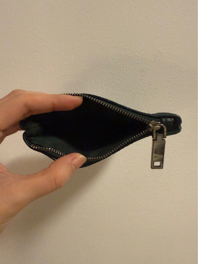 MANGO Faux Croc Leather Cardholder (Category: Wallets & Card holders) located in Makati City. Submitted by nekothrift (Listing ID 1357906707, Image 3). Description: 🐈‍⬛ Dark emerald green color 🐈‍⬛ Faux croc leather with silver hardware 🐈‍⬛ Nylon material on the inside 🐈‍⬛ Can be used as a coin purse also. Sulit buy!.