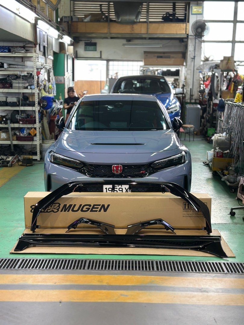 Mugen aerodynamics Group-A body kit for FL5 (Category: Accessories) located in Singapore. Submitted by driven.sg (Listing ID 1357829936, Image 2). Description: See how we install them https://shorturl.at/ZqOsp Front lower lip Side skirts Rear spoiler (All painted) see more details here https://www.mugen-power.com/automobile/products/CIVICTYPE-R_FL5/parts/index.html Group B orders opening soon..