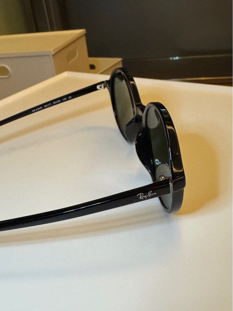 Original Rayban Black Round Sunglasses (Category: Sunglasses & Eyewear) located in Makati City. Submitted by _btdeclutters (Listing ID 1357897826, Image 3). Description: Original 💯 Inclusion: box, case, cleaning cloth Frame shape: round Color: black Never worn! (I have a very round face and eyes and this doesn't suit me huhuhu) #Decluttering.