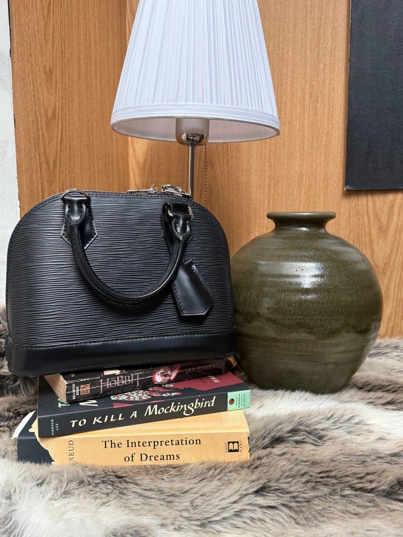 Preloved Louis Vuitton Alma BB Epi Leather (Category: Luxury Bags & Wallets) located in Calamba. Submitted by solalalife (Listing ID 1357838720, Image 2). Description: Preloved LV Alma BB in Epi Leather - ₱90,000 - Bought from the LV store in Greenbelt for ₱130k ( can send receipt upon request) - In prestine condition, used only twice - comes with the crossbody strap, dustbag, box and paper bag - MOP : Gcash, Maya or Bank Transfer - Can do SDD wi