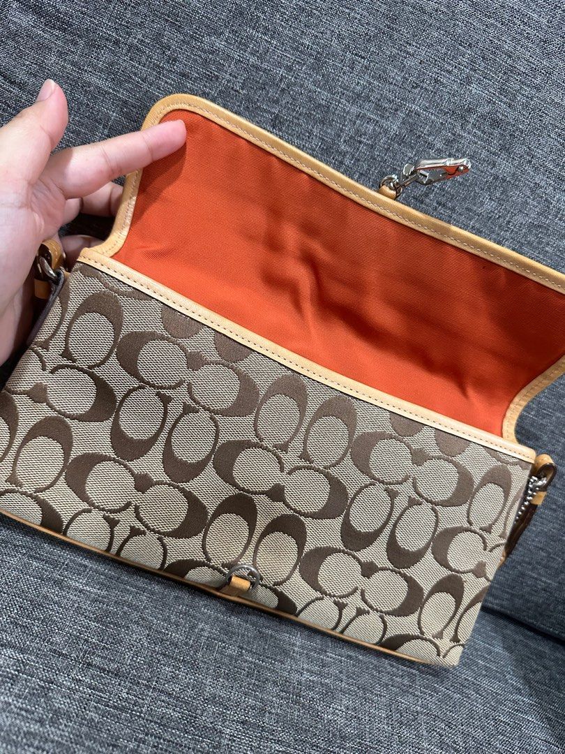 Coach Hampton Signature Clip Bag (Category: Luxury Bags & Wallets) located in Manila. Submitted by vanexacast26785 (Listing ID 1358109605, Image 2). Description: Coach Vintage 6348 Hobo Shoulder Purse With Signature Monogram In Beige EUC Description Size: Height: 15cm Width: 27cm Depth: 3cm Shoulder strap lngth: 51cm (not adjustable) .
