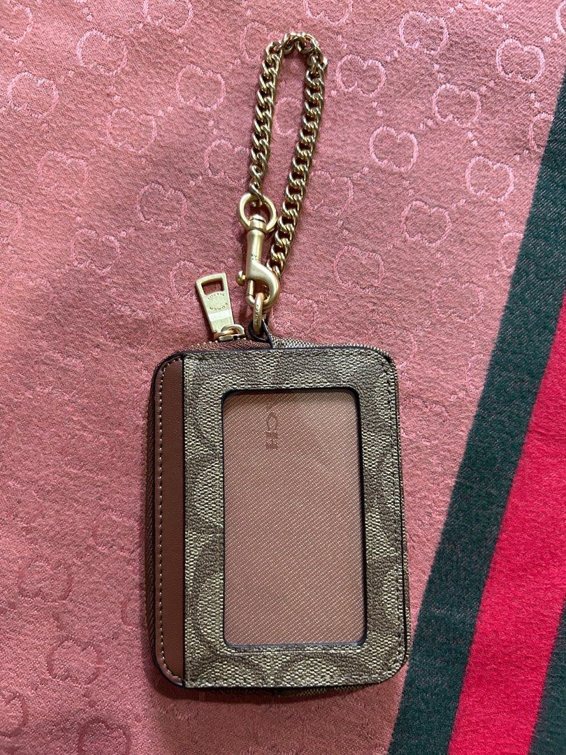 Coach Zip Card Case (Category: Luxury Bags & Wallets) located in Pasay City. Submitted by jhokz5683 (Listing ID 1358052904, Image 2). Description: Coach Zip Card Case Color: Signature Brown Not OG Made from Vietnam .