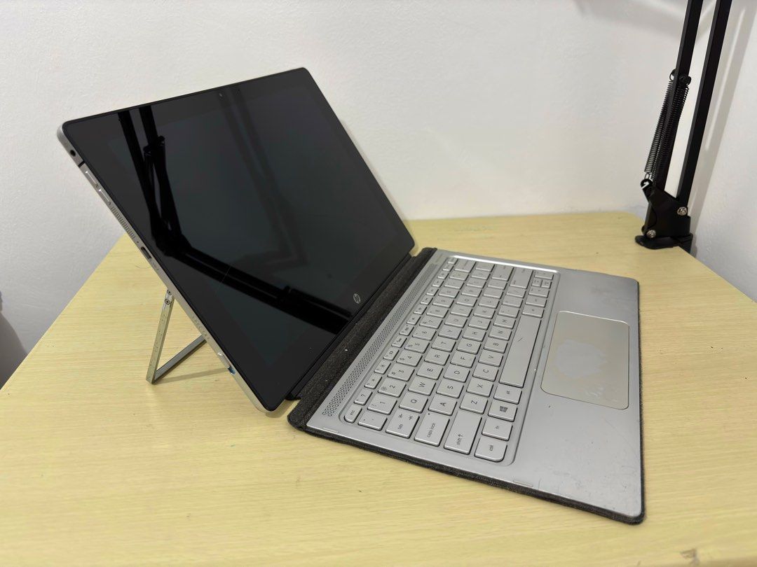 HP Spectre x2 Detachable (Category: Laptops & Notebooks) located in Imus. Submitted by relumenchristian (Listing ID 1358132356, Image 2). Description: HP Spectre x2 12-a009nr – Affordable 2-in-1 Laptop + Bonus Docking Station! Looking for a budget-friendly device for everyday use or spare parts? This HP Spectre x2 12-a009nr is a sleek and portable 2-in-1 that works great when plugged in and comes with a Type-C 5-in-1 docking station for added con