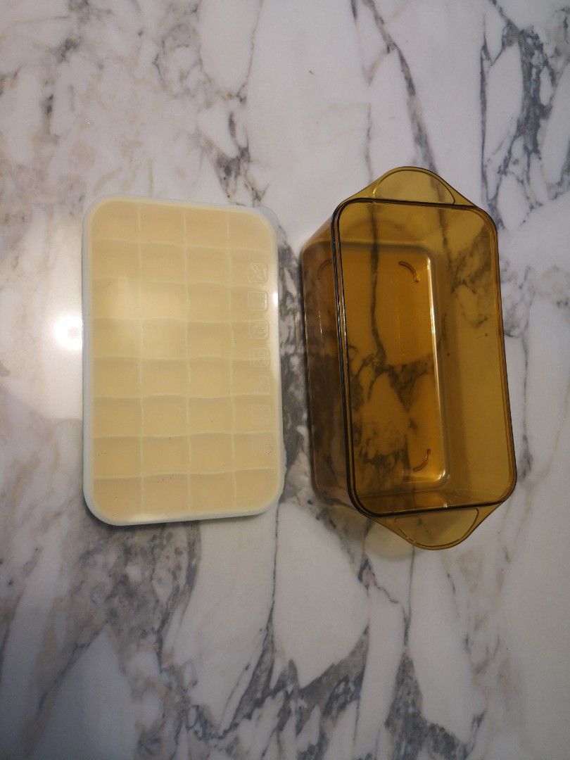 Ice cube maker holder tray with cover (Category: Food Organisation & Storage) located in Singapore. Submitted by dcleart (Listing ID 1358048300, Image 2). Description: Good quality. Silicone material. Easier to remove ice. With cover.