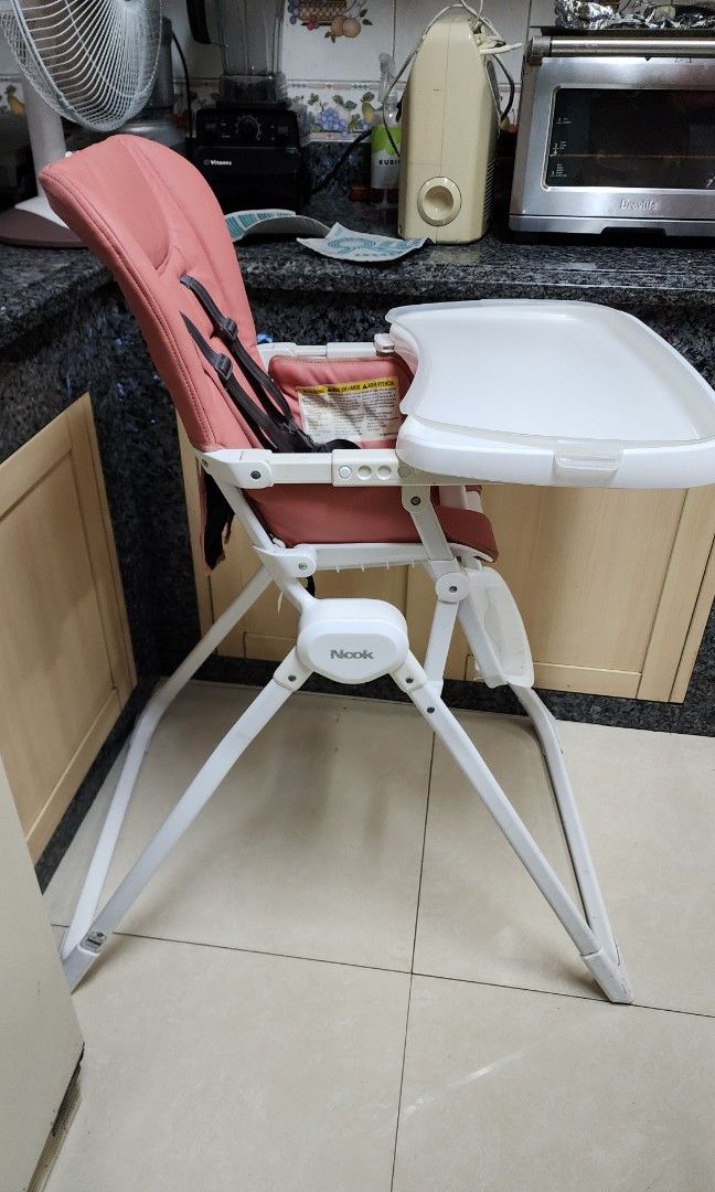 Joovy Nook Foldable High Chair (Category: Baby High Chairs) located in Pasig City. Submitted by perkinpumkin (Listing ID 1358106406, Image 1). Description: Bought from USA 2020 Replaced chair fabric in 2023 Foldable high chair Sturdy Issues: black stains in the fabric Pick up in Pasig.