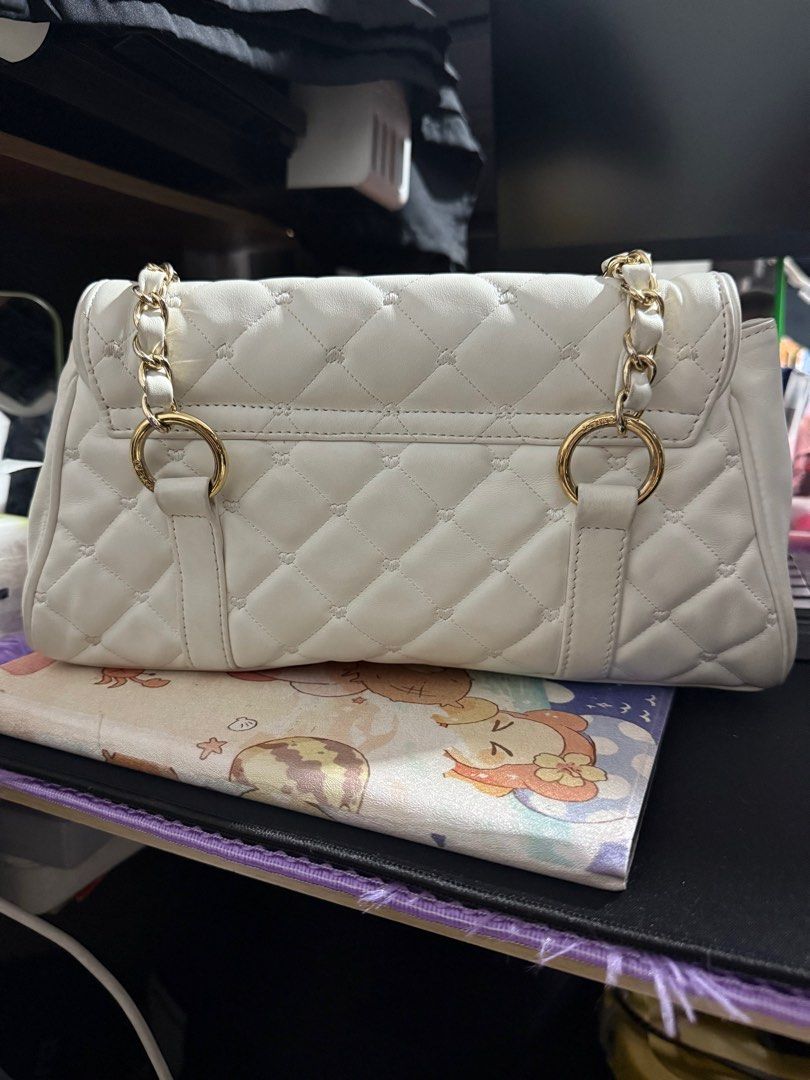 Lovcat Y2k OffWhite Quilted Hand Bag (Category: Luxury Bags & Wallets) located in Manila. Submitted by dreamland.mnl (Listing ID 1358026365, Image 2). Description: Still in good condition Heat tint on lock .