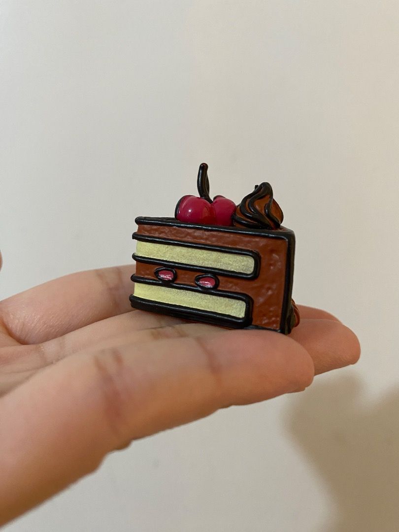 Mini Chocolate Cake Toy Trinket (from Gacha Machine) (Category: Kids Toys) located in Paranaque City. Submitted by patricia_1998 (Listing ID 1358023631, Image 3). Description: Mini Chocolate Cake Toy Trinket (from Gacha Machine) - used as display - got from a gacha machine Grab / Lalamove delivery (shouldered by buyer).