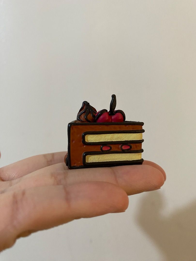 Mini Chocolate Cake Toy Trinket (from Gacha Machine) (Category: Kids Toys) located in Paranaque City. Submitted by patricia_1998 (Listing ID 1358023631, Image 1). Description: Mini Chocolate Cake Toy Trinket (from Gacha Machine) - used as display - got from a gacha machine Grab / Lalamove delivery (shouldered by buyer).
