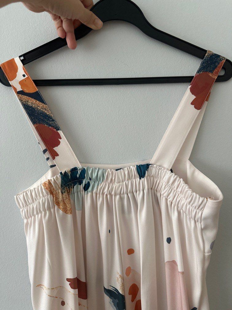 Multi coloured romper (Category: Rompers) located in Singapore. Submitted by mel00123 (Listing ID 1358011663, Image 5). Description: Pit to pit 15” still can stretch to 18” Length 41” Versatile romper To pair with sneakers Very airy Letting go at $20.