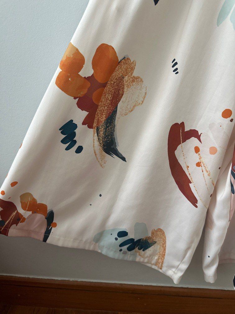 Multi coloured romper (Category: Rompers) located in Singapore. Submitted by mel00123 (Listing ID 1358011663, Image 4). Description: Pit to pit 15” still can stretch to 18” Length 41” Versatile romper To pair with sneakers Very airy Letting go at $20.
