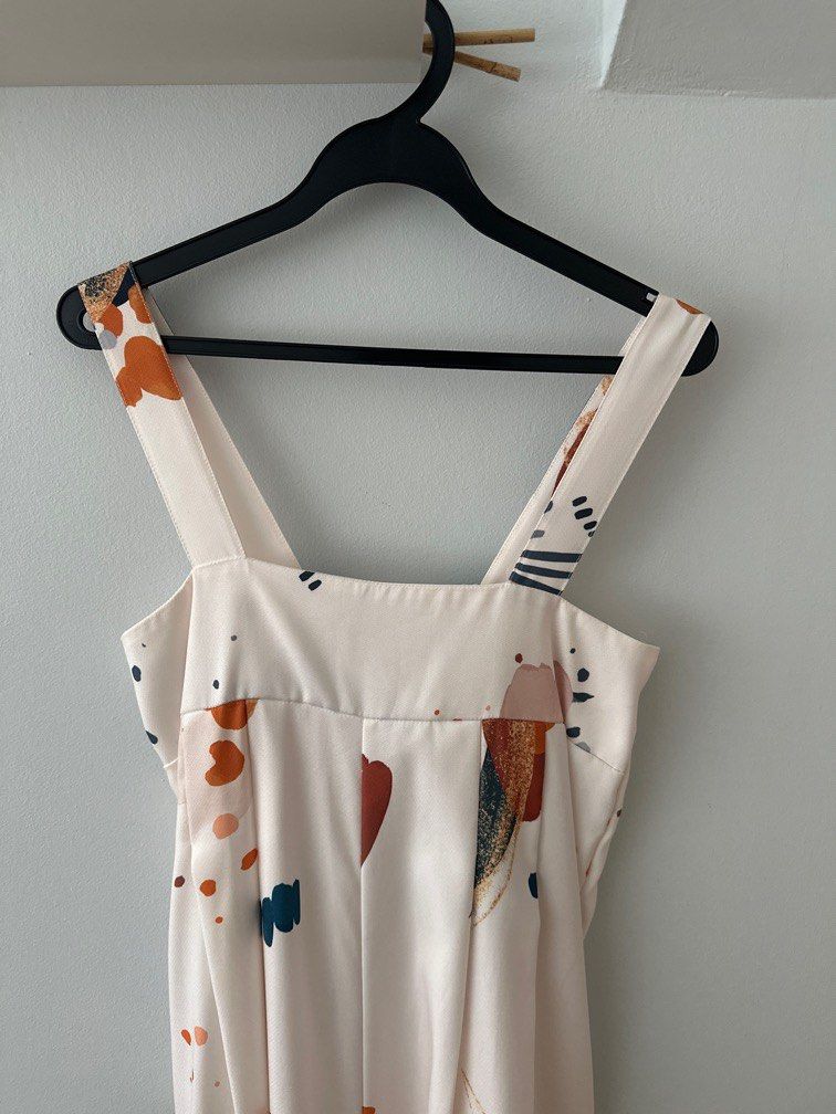 Multi coloured romper (Category: Rompers) located in Singapore. Submitted by mel00123 (Listing ID 1358011663, Image 3). Description: Pit to pit 15” still can stretch to 18” Length 41” Versatile romper To pair with sneakers Very airy Letting go at $20.
