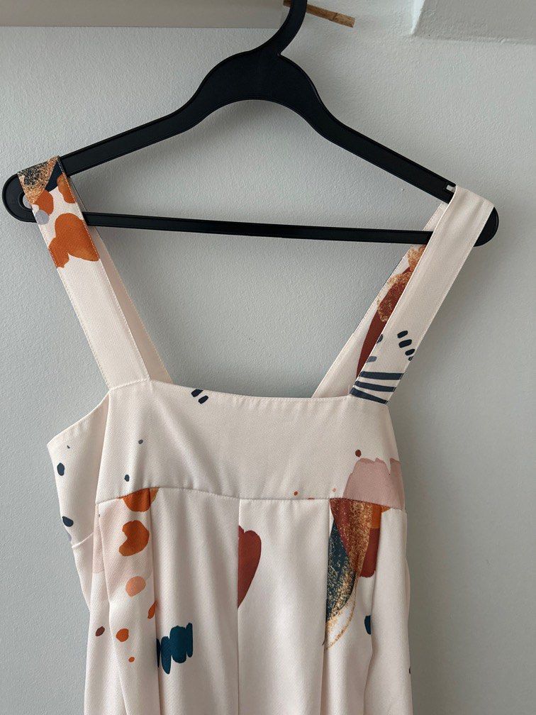 Multi coloured romper (Category: Rompers) located in Singapore. Submitted by mel00123 (Listing ID 1358011663, Image 2). Description: Pit to pit 15” still can stretch to 18” Length 41” Versatile romper To pair with sneakers Very airy Letting go at $20.