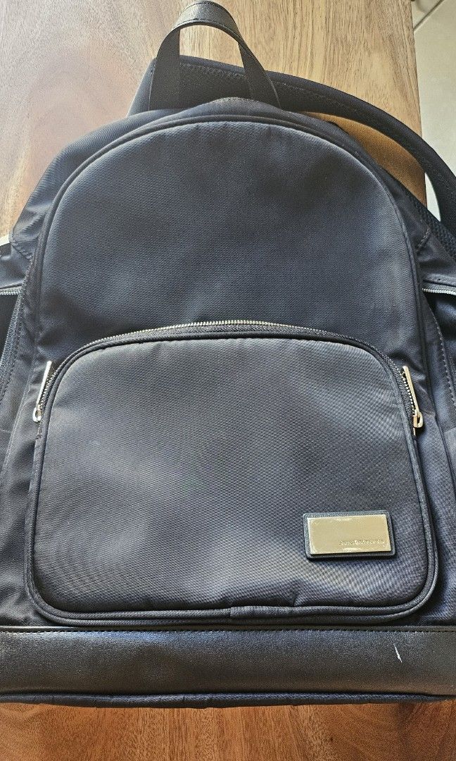 Samsonite Red Nylon Backpack (Category: Laptop Bags & Sleeves) located in Quezon City. Submitted by 88jellyfish88 (Listing ID 1357972277, Image 2). Description: Purchased for about PHP 9,000.00 in Changi airport last November 2023. Been one of my everyday bags hence the scratches on hardware. But still in really good condition. 💶 Gcash/bank transfer 📍QC 🚚 Grab/Lalamove.