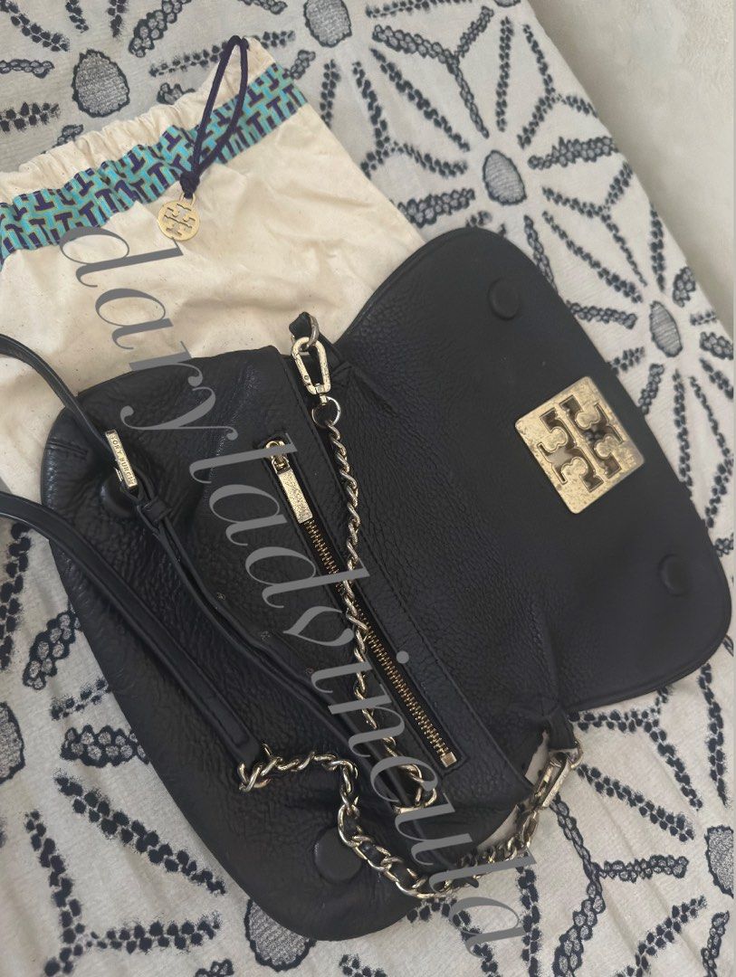 Tory Burch Britten Chain Sling Bag (Authentic) (Category: Luxury Bags & Wallets) located in Pasay City. Submitted by dvncldryl (Listing ID 1358057381, Image 2). Description: ✨ Selling my authentic Tory Burch in Britten chain sling bag, bought in Japan ✨ Rank: B Rfs: Decluttering, need funds Flaws: signs of usage, need to polish hardware and chain, leather's 10/10 ❣️ Less 200 pesos if you take 2 or more bags ❣️Can do SDD, free sf if around Ortigas