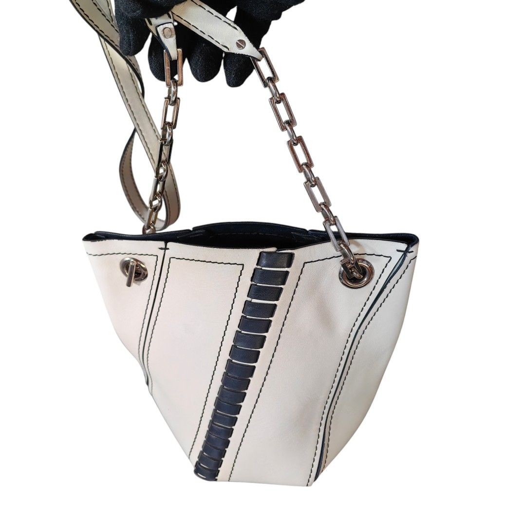 Authentic PROENZA SCHOULER Hex bucket bag (Category: Luxury Bags & Wallets) located in Quezon City. Submitted by maneradesignersboutique (Listing ID 1358167439, Image 1). Description: SALE SALE SALE❗❗❗ Money back Guarantee 💯% Guaranteed authentic *Brand: proeza schouler HEX Bicket bag *Materials: hard calfskin leather *Color: white and black *Size: small *Condition: 8.5/10 never been spa -Used * Inclusions: bag only with provided dustbag Open fo