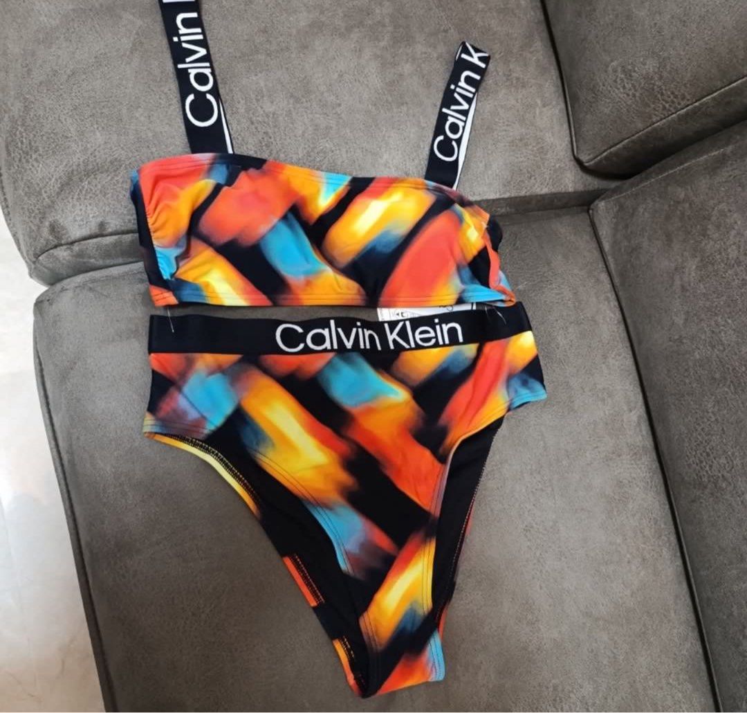 Calvin Klein Swimwear set (Category: Bikinis & Swimsuits) located in Muntinlupa City. Submitted by iampinks (Listing ID 1358306453, Image 3). Description: Like new condition, used it once only. large size, but can fit to medium to Large. Padded..