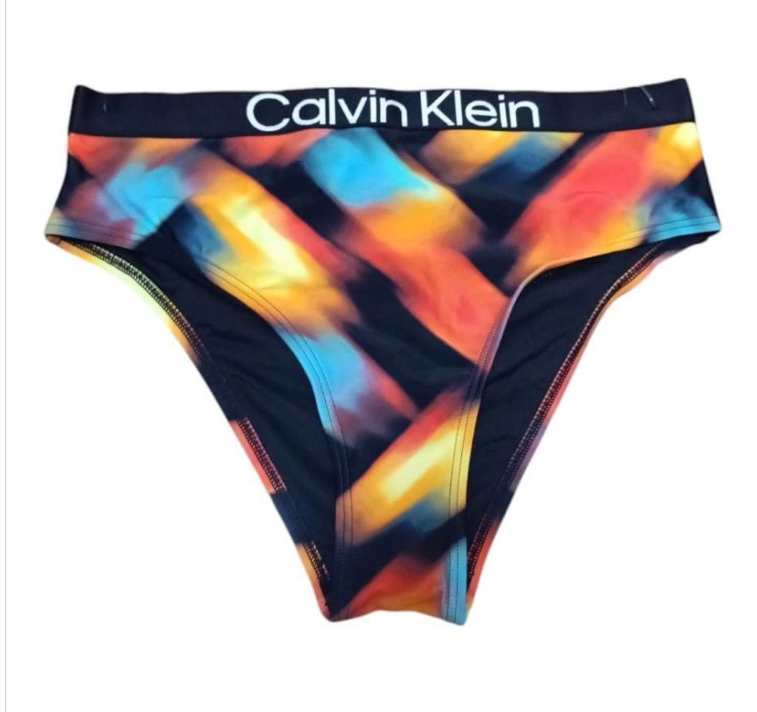 Calvin Klein Swimwear set (Category: Bikinis & Swimsuits) located in Muntinlupa City. Submitted by iampinks (Listing ID 1358306453, Image 2). Description: Like new condition, used it once only. large size, but can fit to medium to Large. Padded..