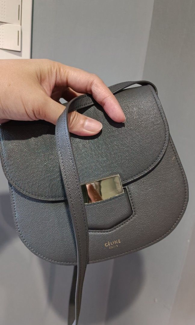 Celine small trotteur bag original (Category: Luxury Bags & Wallets) located in Cavite. Submitted by premfinds (Listing ID 1358233145, Image 1). Description: self Auth is advised for Japan bought celine honest issue na change na 1 screw inside see last photo signs of use sa gilid lang ng strap as the bag only no other inclusions thus selling low. steal price na yan if you Chek other super nakakalula price. RFS hindi ko na bet, change wardrobe na.