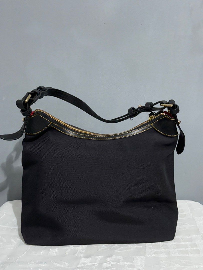 Dooney & Bourke Hobo Bag (Category: Shoulder Bags) located in Manila. Submitted by mitochondriaa (Listing ID 1358276119, Image 2). Description: RFS: Need funds for hospital bills PRICE POSTED IS THE LAST PRICE .