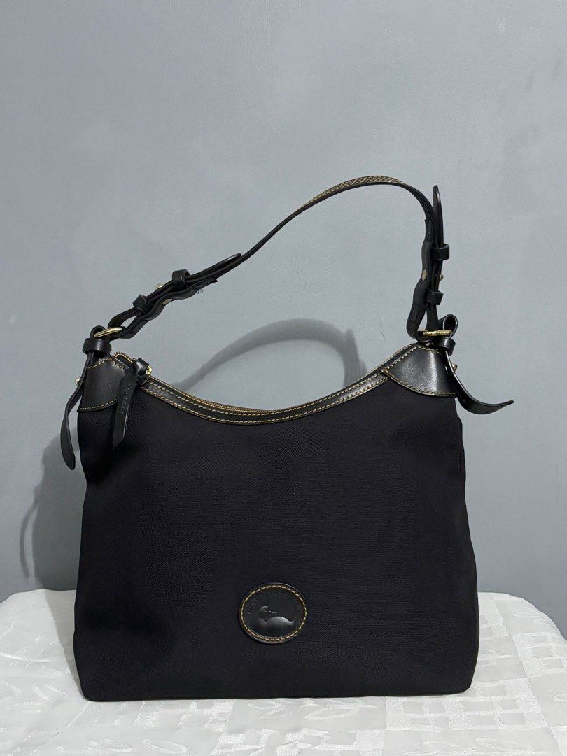 Dooney & Bourke Hobo Bag (Category: Shoulder Bags) located in Manila. Submitted by mitochondriaa (Listing ID 1358276119, Image 1). Description: RFS: Need funds for hospital bills PRICE POSTED IS THE LAST PRICE .
