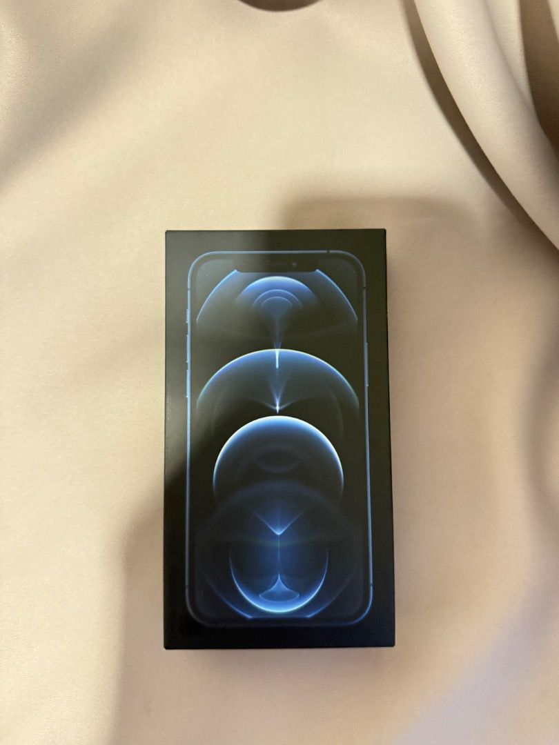 FOR SALE: iPhone 12 Pro, 128GB (Category: iPhone 12 Series) located in Mandaluyong City. Submitted by margomalabanan (Listing ID 1358174278, Image 3). Description: FOR SALE: iPhone 12 Pro 128GB Color: Pacific Blue Battery health: 77% With box and original cord Open line RFS: Upgrade Price: Php21k negotiable.
