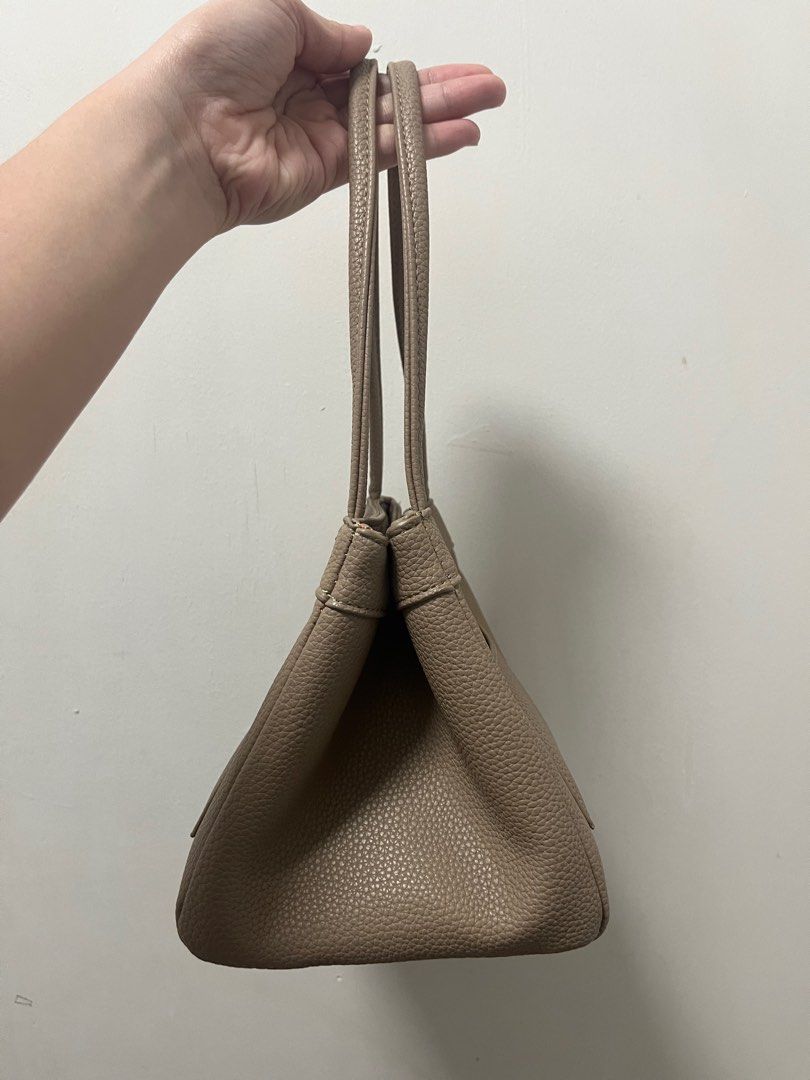 House of Little Bunny Dumpling (Category: Shoulder Bags) located in Imus. Submitted by _anndvr (Listing ID 1344565355, Image 3). Description: House of Little Bunny Dumpling in Gris T. 🤎 Pre-loved, PU no issue. Comes with dustbag. Both pockets are removable with short strap. Magnetic lock. Can ship thru lalamove or LBC. LOC: Imus, Cavite.