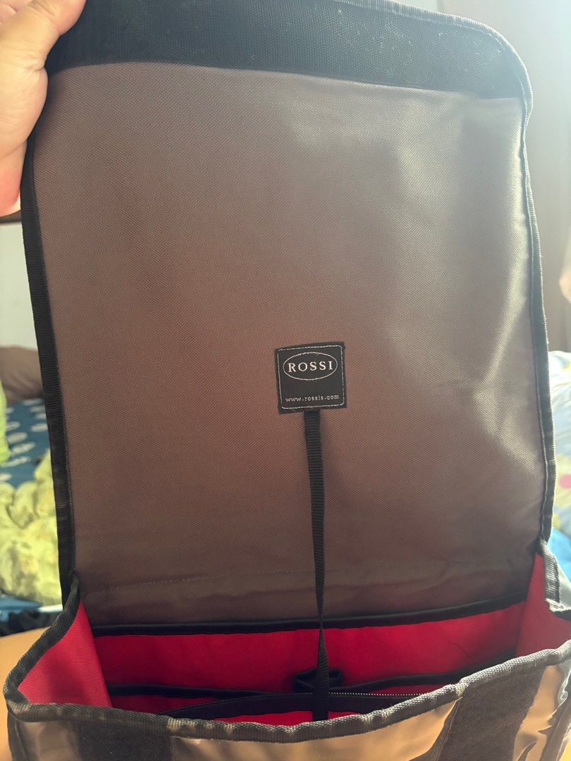 Laptop / sling bag (Category: Laptop Bags & Sleeves) located in Cainta. Submitted by flight.attendant.honey (Listing ID 1358180569, Image 3). Description: Original Rossi bag from Switzerland. Not ukay. Grandparents are from Zurich kaya most of items are from Zurich..