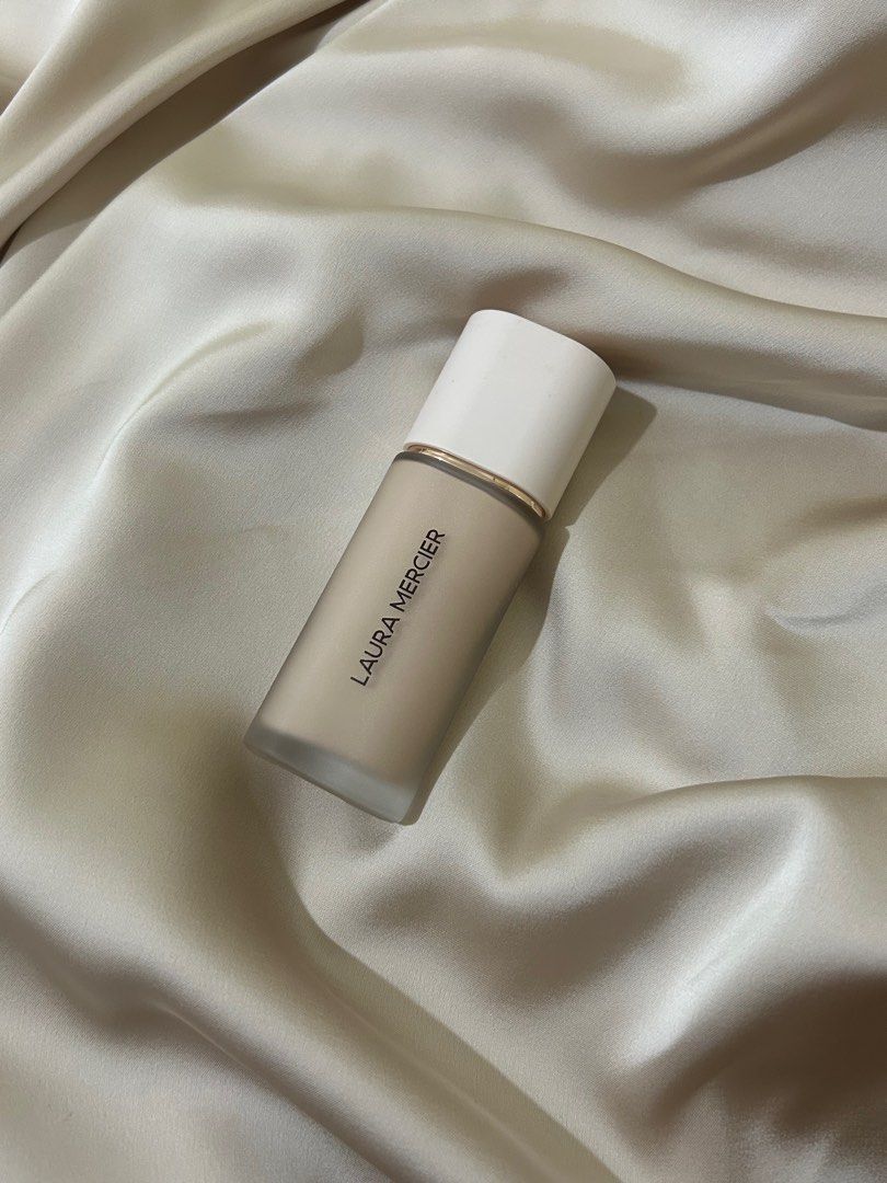 Laura Mercier Real Flawless Foundation (SILK) (Category: Makeup) located in Makati City. Submitted by jiyoothepomspitz (Listing ID 1358315530, Image 1). Description: original bought from rustans makati barely used 98% full.