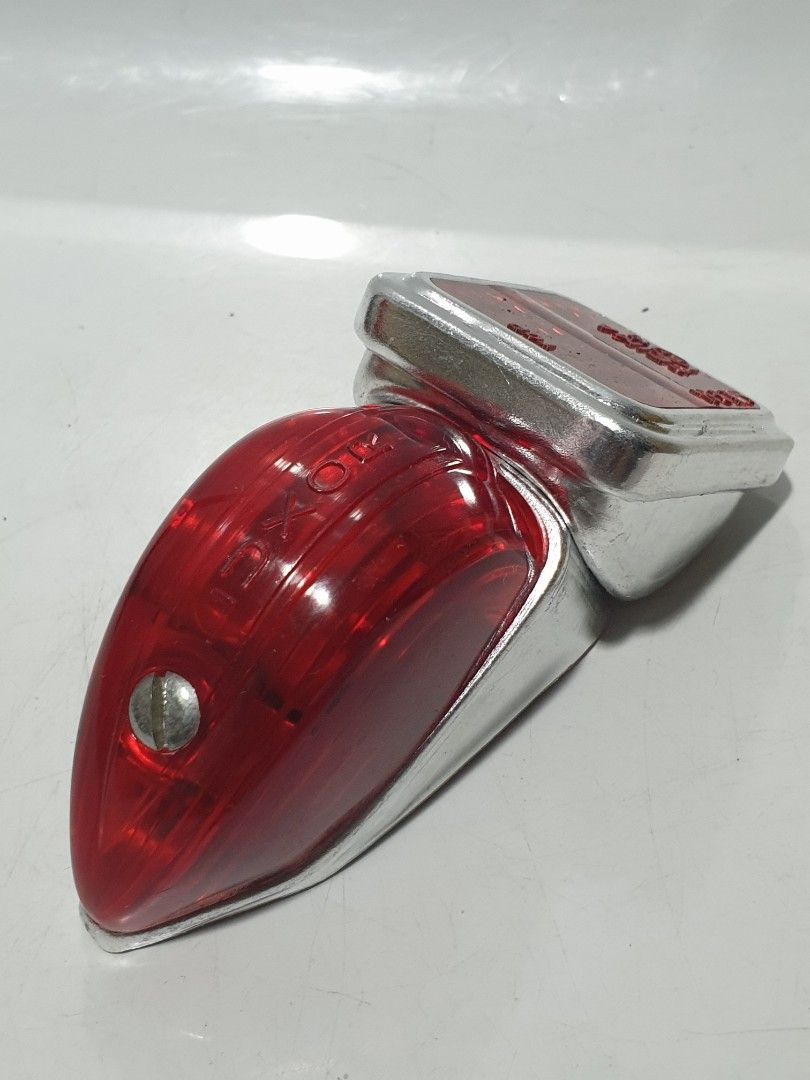 Luxor Vintage Bicycle Tail Light and Reflector (Category: Bicycles) located in Las Pinas. Submitted by oldsthetics (Listing ID 1358328899, Image 2). Description: Luxor Vintage Bicycle Tail Light and Reflector NOS Vintage stocks For rear fender attachment Fixture only no bulb and wires With screws For serious vintage bicycle enthusiasts, collectors and restorers who's looking for a period correct parts maintaining the historical authenticity and n
