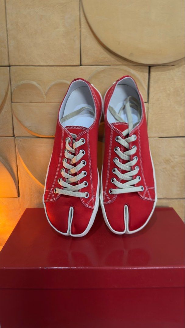 Maison Margiela Tabi Sneakers 43 (Category: Sneakers) located in San Fernando. Submitted by dopeeywobeey (Listing ID 1358193970, Image 3). Description: Maison Margiela Tabi Sneakers in Red Satin Limited Edition Tabi Sneakers Comes with Box, Dustbags and Tags Guaranteed Authentic Selling below retail Never Used Size 43 Fits 42-43.