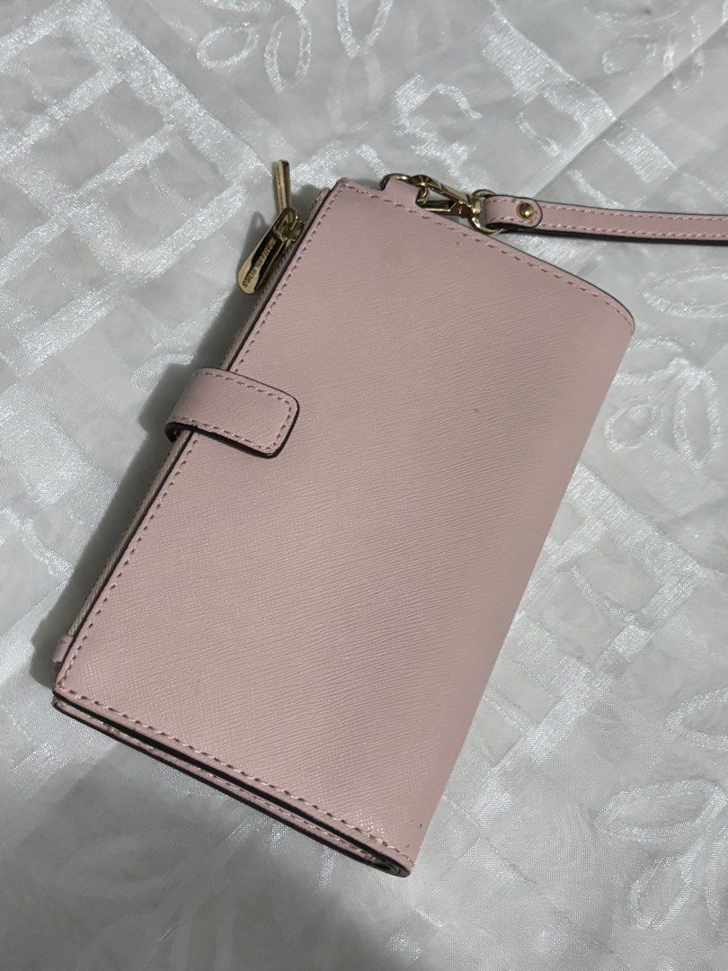 Michael Kors Adele Pebbled Leather Smartphone Wallet (Category: Luxury Bags & Wallets) located in Manila. Submitted by mitochondriaa (Listing ID 1358308173, Image 2). Description: Rfs: Need funds.