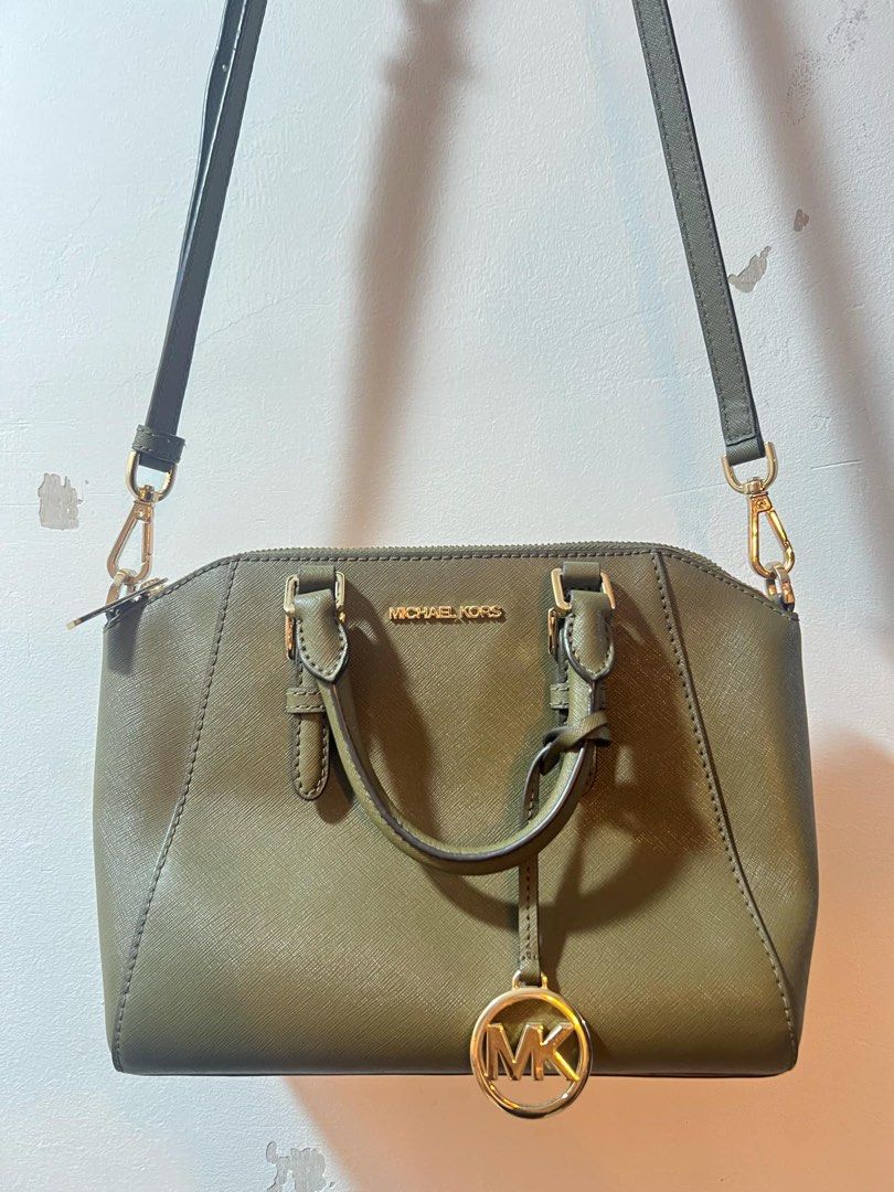 Original Michael Kors Crossbody / Sling Bag (Category: Luxury Bags & Wallets) located in Marikina City. Submitted by jeyreyney (Listing ID 1358178443, Image 1). Description: Original Michael Kors Ciara Crossbody Olive Green bag (Preloved) ₱3,000 Preloved - in good condition Original MK Color: Olive green Size: Medium See photos for slight defects (zipper and sling) No paperbag/dust bag MOP: Gcash, BPI Loc: Marikina/Manila area.