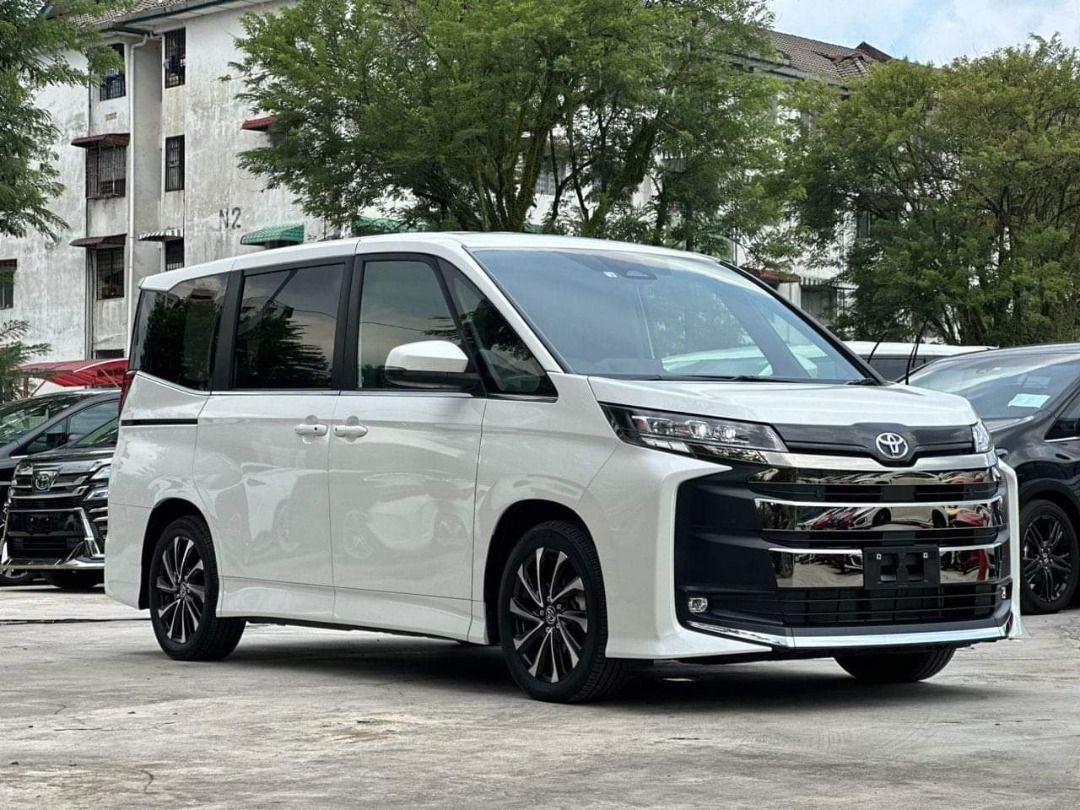 Toyota Noah 1.8 X Hybrid Auto (Category: Used Cars) located in Singapore. Submitted by lc.auto (Listing ID 1358284817, Image 3). Description: 🚗 𝐓𝐨𝐲𝐨𝐭𝐚 𝐍𝐨𝐚𝐡 𝟏.𝟖𝐋 𝐇𝐲𝐛𝐫𝐢𝐝 – 𝐏𝐞𝐫𝐟𝐞𝐜𝐭 𝐌𝐏𝐕 𝐟𝐨𝐫 𝐅𝐚𝐦𝐢𝐥𝐢𝐞𝐬 & 𝐏𝐇𝐕! 🚀 💎 Spacious, Efficient & Ultra Comfortable – Drive with Ease! ✨ Key Features: ✅ 1.8L Hybrid Engine – Fuel Efficient & Eco-Friendly ⚡ ✅ Toyota Safety Sense – Advanced Safety Features 🚦 ✅ Spacious 7-Sea