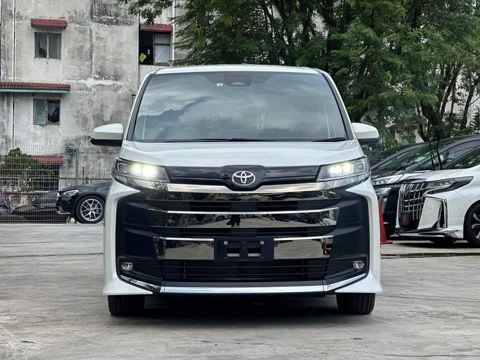 Toyota Noah 1.8 X Hybrid Auto (Category: Used Cars) located in Singapore. Submitted by lc.auto (Listing ID 1358284817, Image 2). Description: 🚗 𝐓𝐨𝐲𝐨𝐭𝐚 𝐍𝐨𝐚𝐡 𝟏.𝟖𝐋 𝐇𝐲𝐛𝐫𝐢𝐝 – 𝐏𝐞𝐫𝐟𝐞𝐜𝐭 𝐌𝐏𝐕 𝐟𝐨𝐫 𝐅𝐚𝐦𝐢𝐥𝐢𝐞𝐬 & 𝐏𝐇𝐕! 🚀 💎 Spacious, Efficient & Ultra Comfortable – Drive with Ease! ✨ Key Features: ✅ 1.8L Hybrid Engine – Fuel Efficient & Eco-Friendly ⚡ ✅ Toyota Safety Sense – Advanced Safety Features 🚦 ✅ Spacious 7-Sea