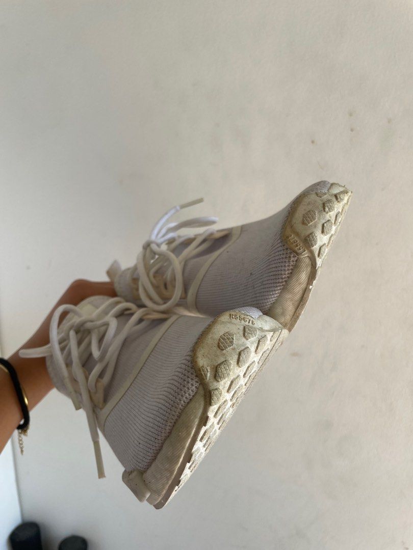 Adidas NMD (Category: Sneakers) located in Quezon City. Submitted by _pufferfish (Listing ID 1358432935, Image 2). Description: Original Adidas NMD R1 White US 5 / UK 4 1/2 Worn twice then just left in cabinet A little yellow on some areas Bought for around 7k Super negotiable :) RFS decluttering MOP: BDO / Gcash SF through Grab/Lalamove shouldered by buyet.