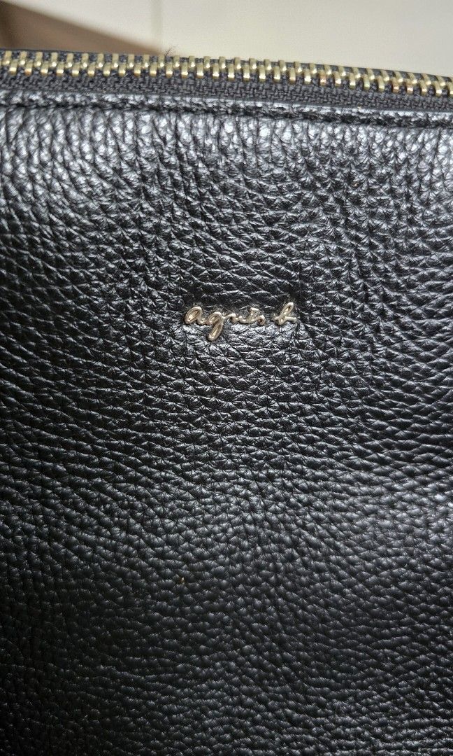 Agnes b Mini Boston Bag (Category: Bags & Wallets) located in Singapore. Submitted by adebarang (Listing ID 1358399319, Image 3). Description: Very spacious, black pebbled leather resistant to scratches. Zip top closure. Size like LV Speedy 30. Comes with long adjustable strap. Collection at Tampines Ave 8 530893.
